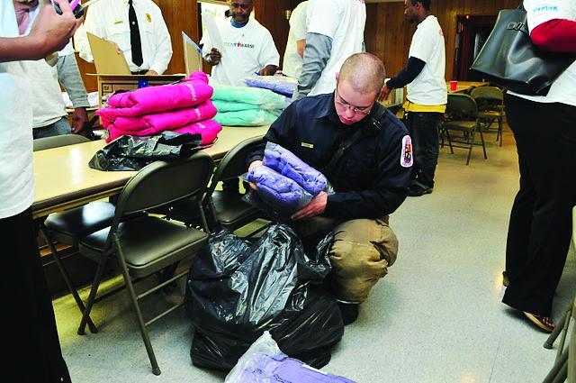 Firefighters, deputies gather coats for needy kids