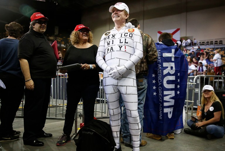 Ironically, the barrier between Donald Trump and his signature political project will be precisely what Trump continuously rails against. (AP Photo/Brynn Anderson)