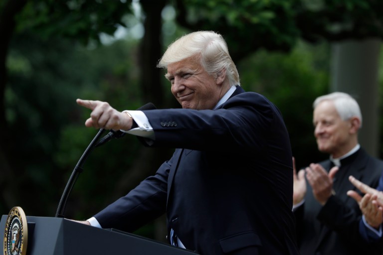 Dissatisfaction with American leadership is up since President Trump's election, but economic worries are down. (AP Photo/Evan Vucci)