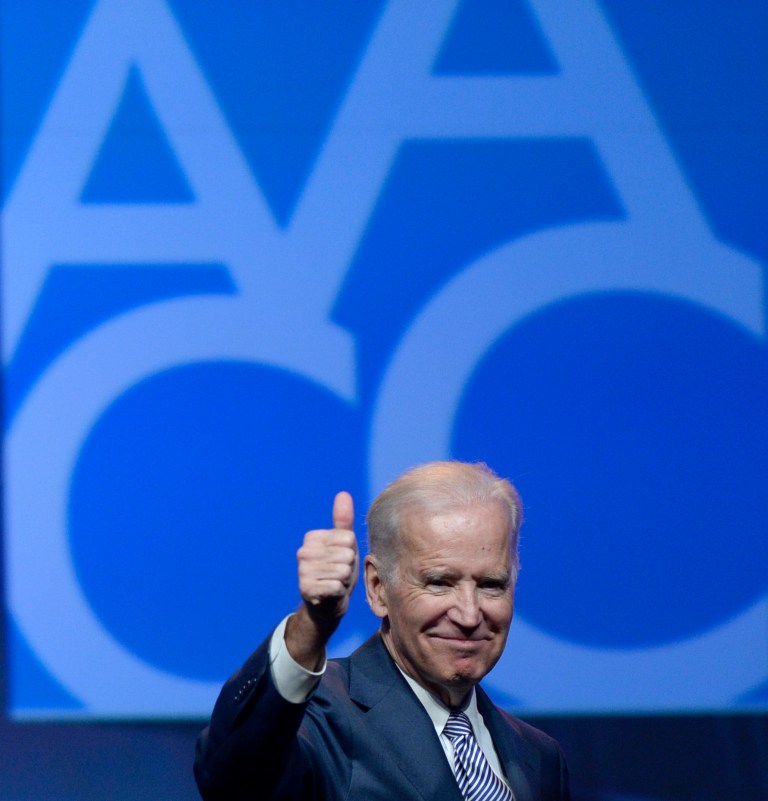 Vice President Joe Biden gives a thumbs up after speaking at the American Association of Community Colleges' 94th Annual Convention in Washington, Monday, April 7, 2014. (AP Photo/Susan Walsh)