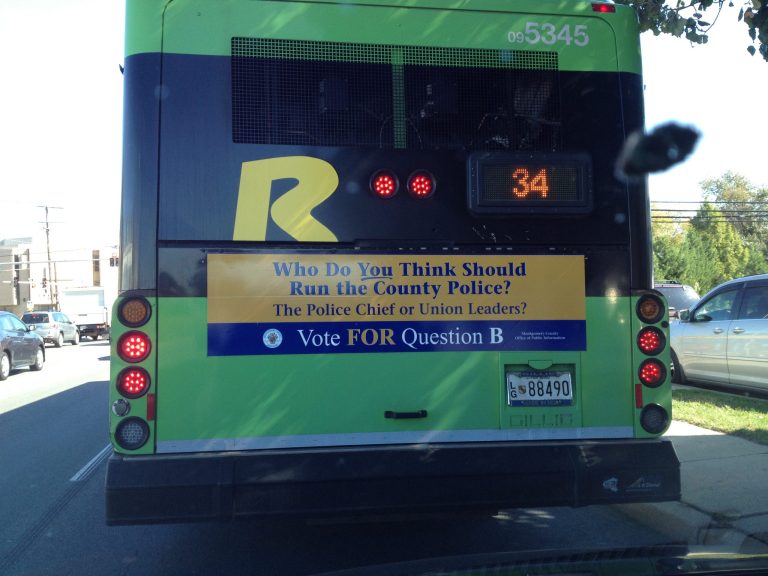 A Ride On bus with an advertisement about the ballot measure (Rachel Baye/Examiner)