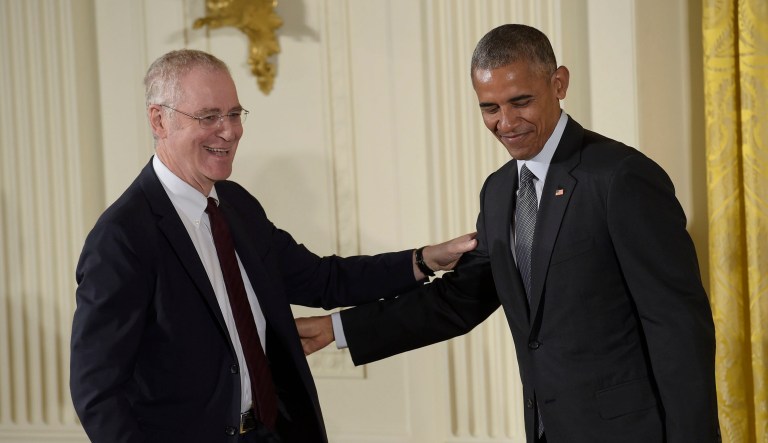 Former President Barack Obama shares a laugh with author Ron Chernow before presenting him with the 2015 National Humanities Medal during a ceremony in the East Room of the White House in Washington, Thursday, Sept. 22, 2016. 
