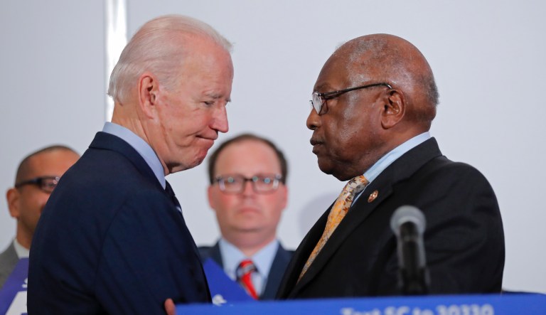 Joe Biden (right) talks to Rep. James Clyburn (D-SC, left) at a primary night election rally in Columbia, South Carolina, on Feb. 29, 2020 after winning the South Carolina primary.                                                                                                                                               