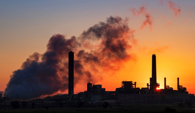 In this July 27, 2018 photo, the Dave Johnson coal-fired power plant is silhouetted against the morning sun in Glenrock, Wyoming. The Trump administration on Tuesday proposed a major rollback of Obama-era regulations on coal-fired power plants, striking at one of the former administrationâs legacy programs to rein in climate-changing fossil-fuel emissions. 