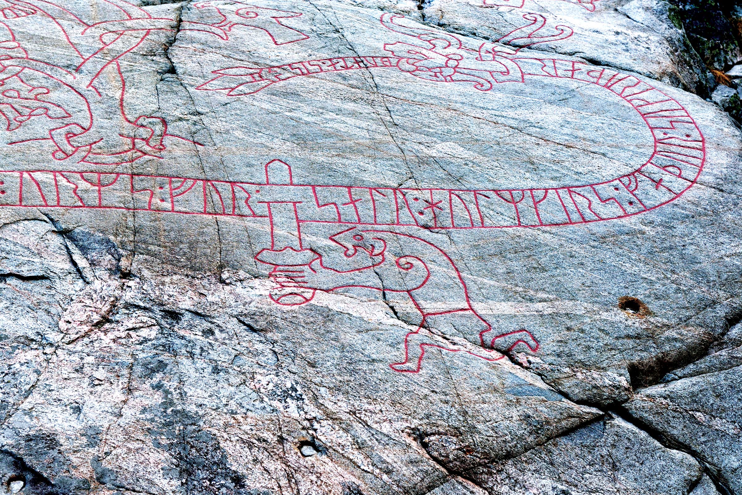 Detail from the Ramsund carving, a Viking runestone (ca. 1030) depicting Sigurd slaying the dragon Fafnir.