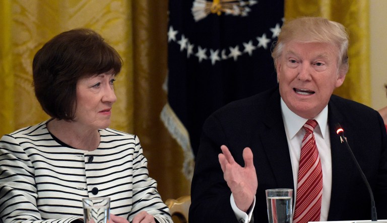 President Donald Trump, center, speaks as he meets with Republican senators on health care in the East Room of the White House in Washington, Tuesday, June 27, 2017. Sen. Susan Collins, R-Maine, left, and Sen. Lisa Murkowski, R-Alaska, right, listen.