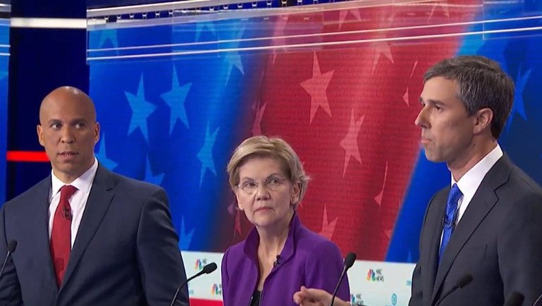 Cory Booker glares at Beto O'Rourke as he answers first debate question in Spanish