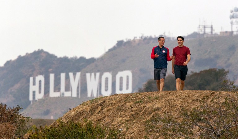 Los Angeles Mayor Eric Garcetti, left and Canadian Prime Minister Justin Trudeau take a hike in the Hollywood hills after a news conference at the Griffith Observatory in Los Angeles. (AP Photo/Damian Dovarganes)