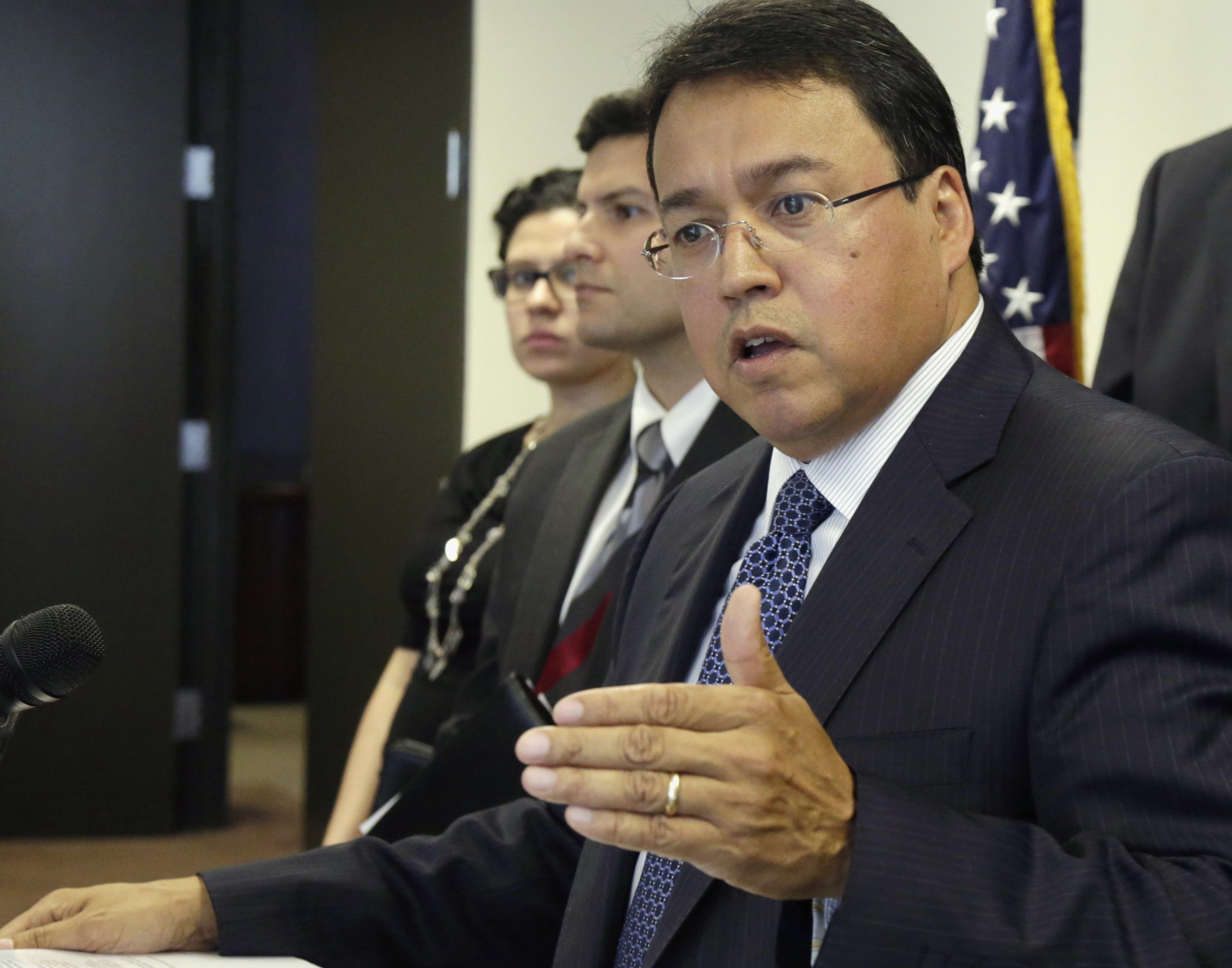 Layoffs raise new issues in state hiring dispute