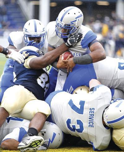 Luis M. Alvarez/AP
Quarterback Tim Jefferson scored on a 1-yard touchdown run in overtime to help lead Air Force to a win over Navy on Saturday.