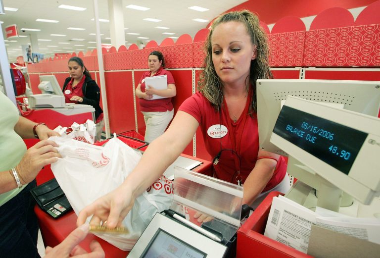 Target cashier rings up customers at a Target store May 15, 2006 in Albany, California. (Photo by Justin Sullivan/Getty Images)