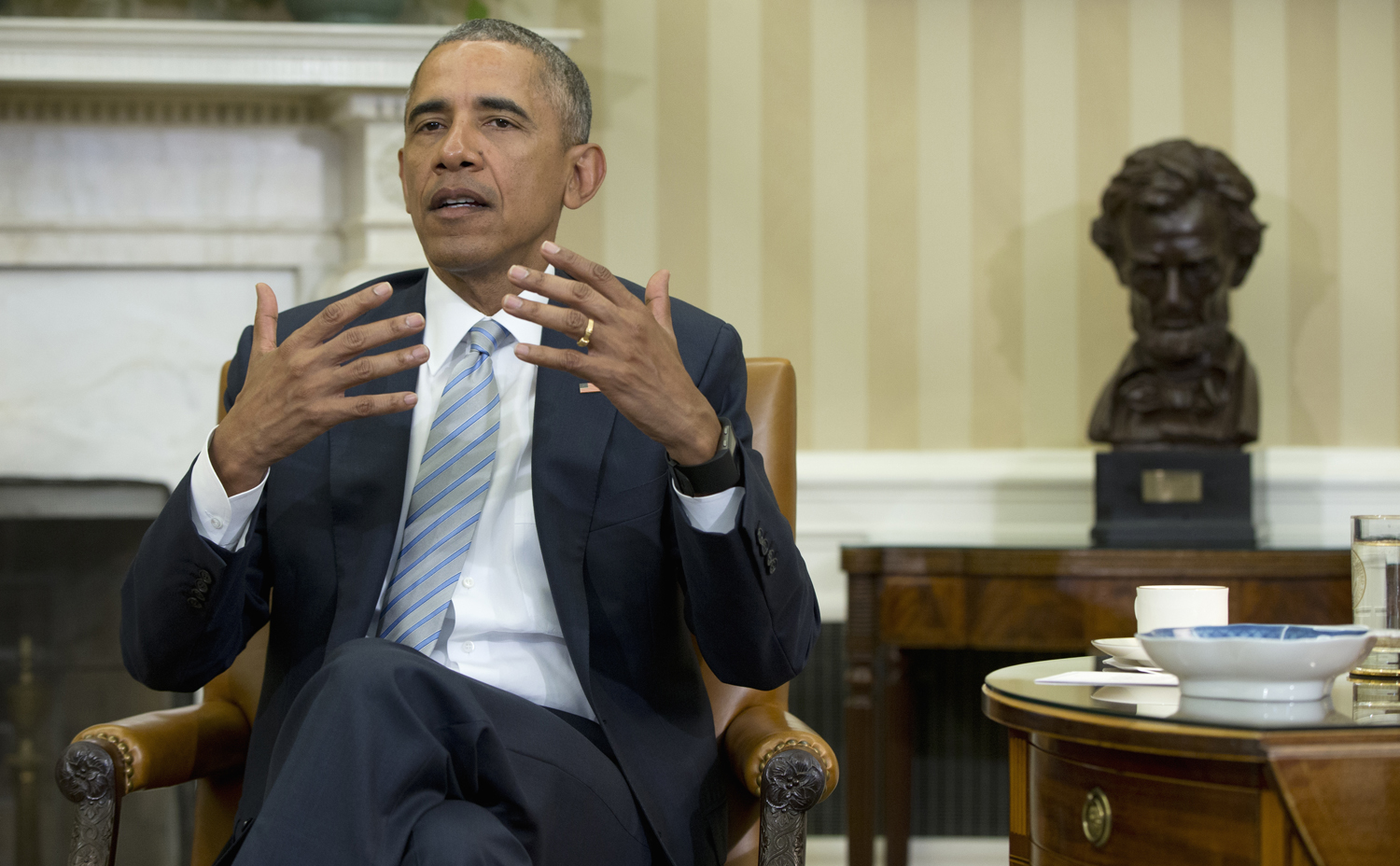 Obama defends planned Cuba trip