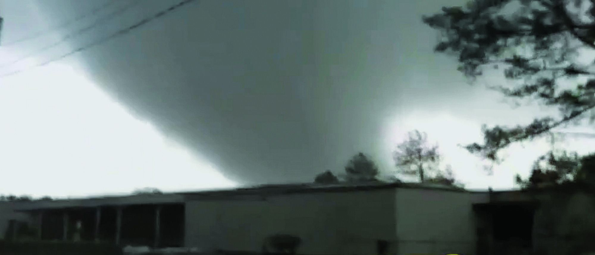 Powerful storm flips cars, decimates homes; 2 dead