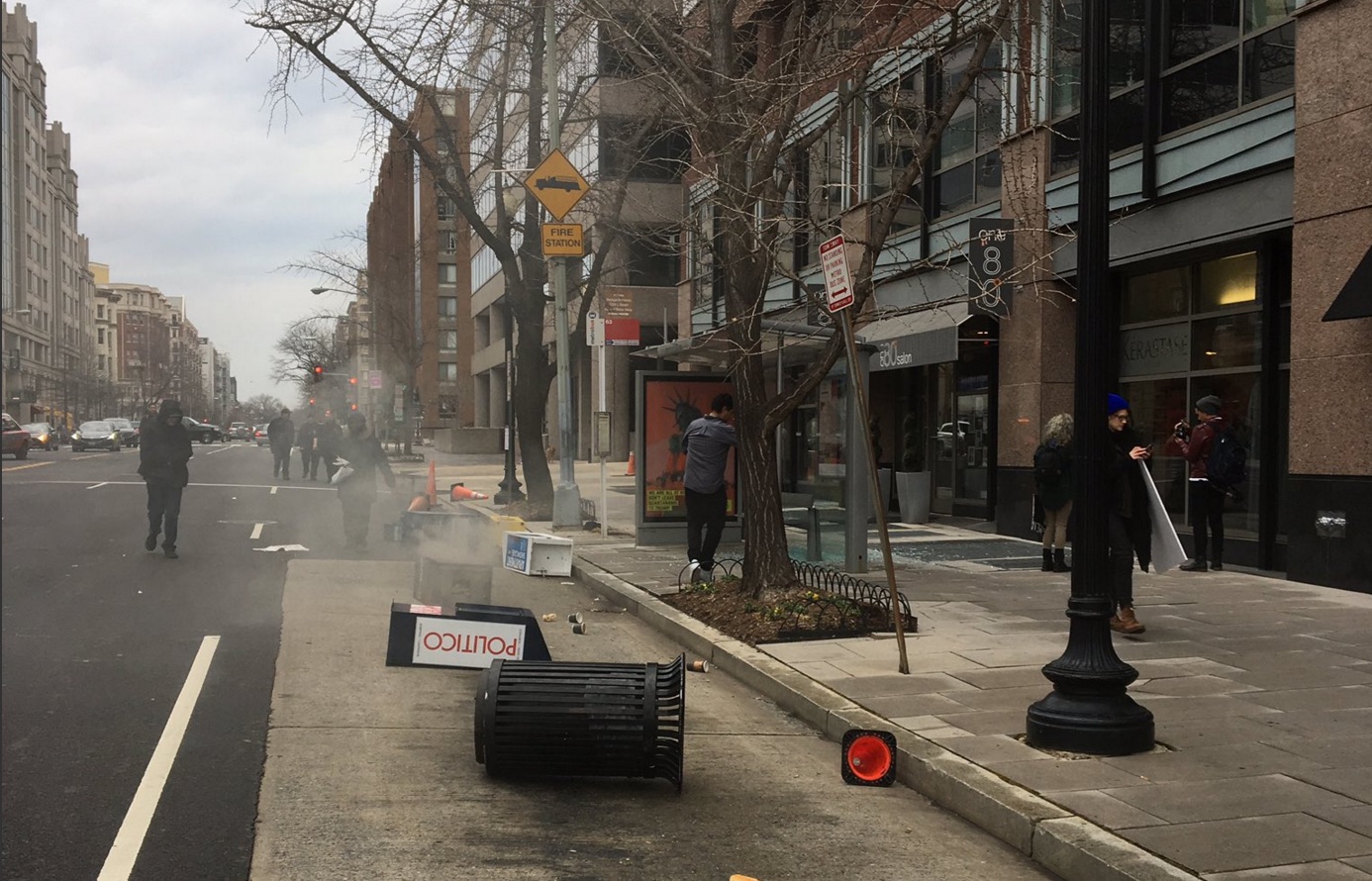 Inauguration protesters vandalize businesses, break windows