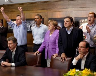 America Plods Forward, Much of the World Slows