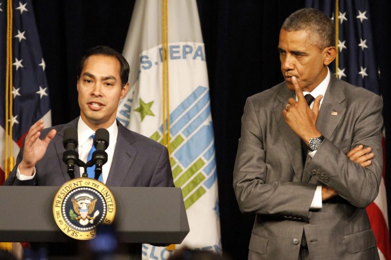 President Barack Obama listens as he is introduced by new Housing and Urban Development Secretary Julian Castro, Thursday, July 31, 2014, at the Housing and Urban Development Department in Washington. (AP Photo/Jacquelyn Martin)