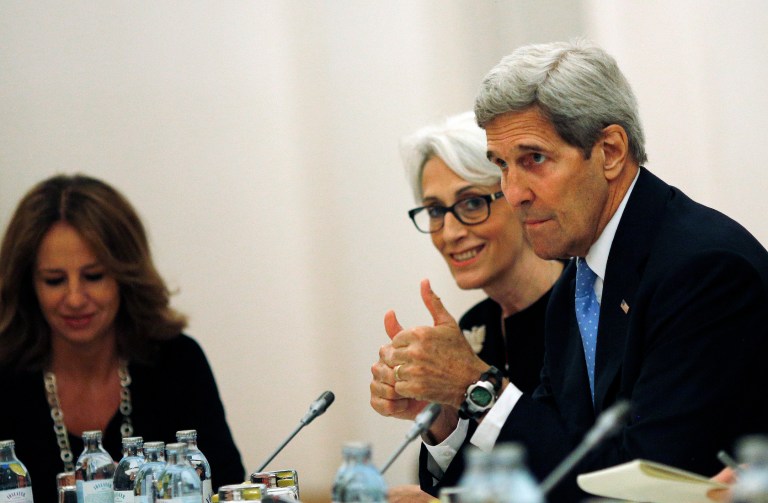 U.S. Secretary of State John Kerry and U.S. Under Secretary for Political Affairs Wendy Sherman, centre, meet with foreign ministers and representatives of Germany, France, China, Britain, Russia and the European Union during the current round of nuclear talks with Iran, being held in Vienna, Austria July 10, 2015. (Carlos Barria/Pool via AP)