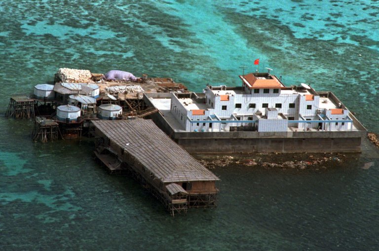 A Chinese official lashed out at the U.S. on Friday, a day after the U.S. Navy released a video showing the extent of Beijing's reef-building operations in the South China Sea. (AP Photo)