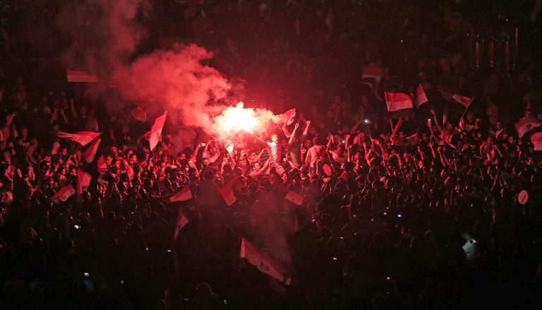 Opponents of Egypt's Islamist leader Mohamed Morsi celebrate outside the presidential palace in Cairo on Wednesday. 