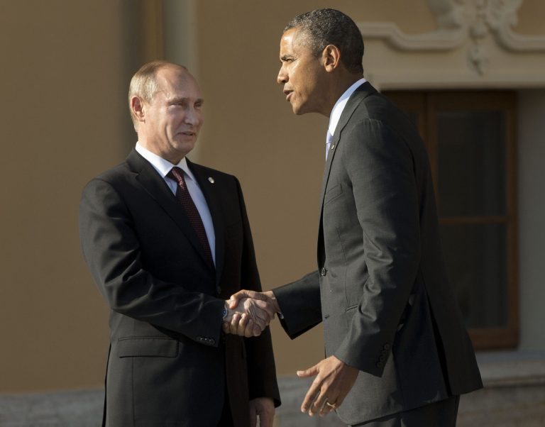   FILE - In this Sept. 5, 2013 pool-file photo, President Barack Obama shakes hands with Russia's President Vladimir Putin during arrivals for the G-20 summit at the Konstantin Palace in St. Petersburg, Russia. âWeâve kind of hit a wall,â President Barack Obama said on his way to Russia last week. He meant his relationship with Moscow, but the remark came to apply, too, to other leaders abroad, lawmakers at home and even Americans at large, all standing in the way of his plans to punish Syria for using chemical weapons. Just days later, military action is on hold, diplomacy has some steam and Obama no longer looks so alone. (AP Photo/Pablo Martinez Monsivais, Pool-File)  