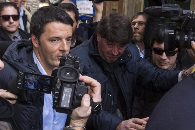 Democratic Party secretary Matteo Renzi arrives to speak at a party leadership meeting to decide whether to yank support from Letta's fragile coalition government, accusing the premier of failing to make progress on key financial reforms, in Rome Thursday, Feb. 13, 2014. Italian Premier Enrico Letta faces a new challenge to his leadership Thursday as the head of his own party tried to orchestrate a power grab. Renzi, 39, has been critical of Letta since December, when Renzi was voted head of their Democratic Party. If successful, Renzi could be tapped to form a new government. (AP Photo/Roberto Monaldo)  ITALY OUT