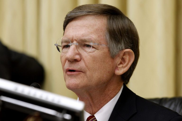 Rep. Lamar Smith, R-Texas, questions Attorney General Eric Holder on Capitol Hill in Washington in June 2012. (AP Photo/Charles Dharapak)