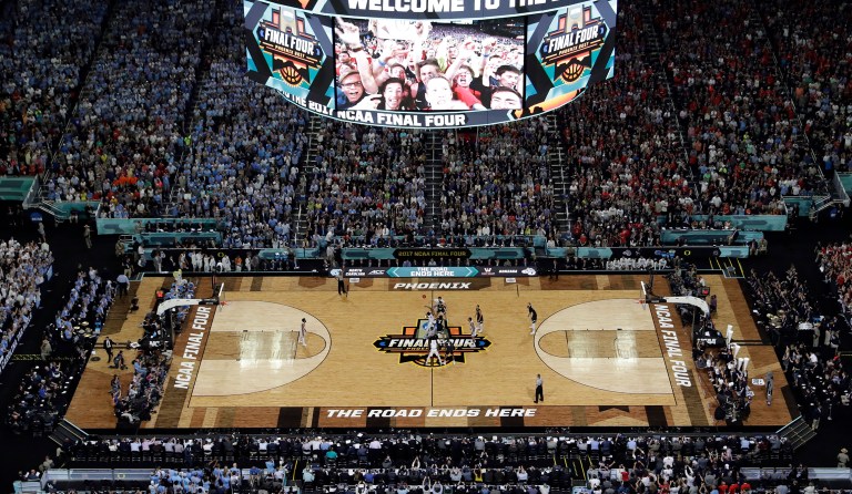 Members of Congress have requested to be briefed by the National Collegiate Athletic Association and sports companies connected to a college basketball bribery scandal, following the arrest of 10 people in college basketball on Tuesday. (AP Photo/Morry Gash)