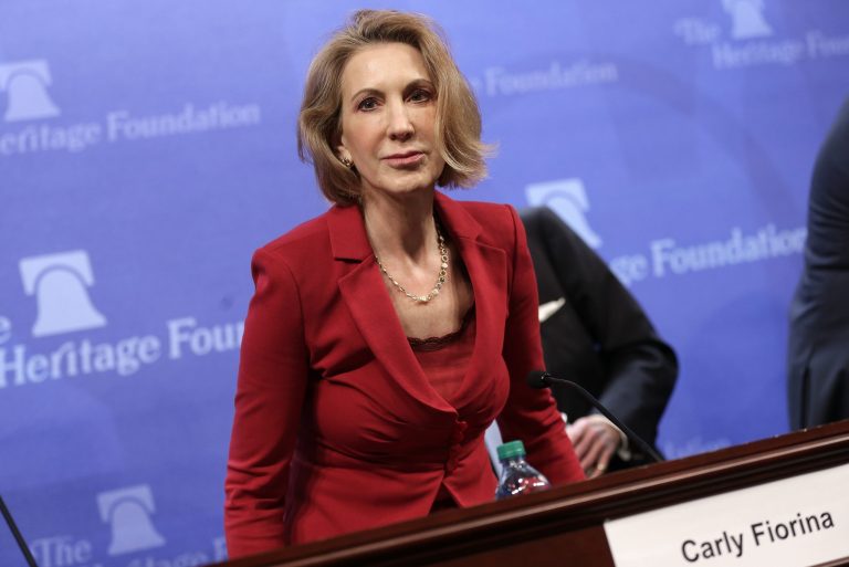 Carly Fiorina, former CEO of the Hewlett-Packard Company, arrives for an appearance at the Heritage Foundation December 18, 2014 in Washington. (Photo by Win McNamee/Getty Images)