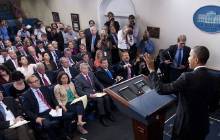 White House briefing room with President Obama. AP Photo