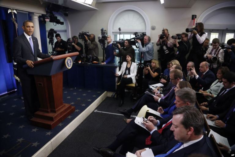 President Obama briefs the media. AP Photo