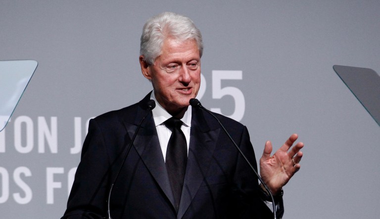 Clinton also selected a deck of cards of famed St. Louis Cardinals players and two books for his grandchildren. (Photo by Andy Kropa/Invision/AP)