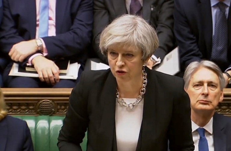 Britain's Prime Minister Theresa May speaks in the Houses of Parliament following the attack in London Wednesday. (PA via AP)