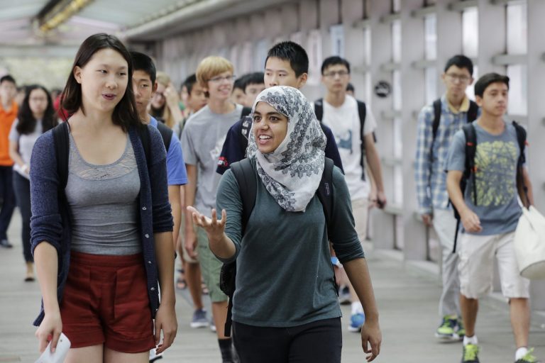 Students arrive for the first day of school at Stuyvesant High School, Wednesday, Sept. 9, 2015 in New York. New York CityÂ already lets parents choose a school within their district.Â (AP Photo/Mark Lennihan)