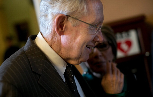 WASHINGTON, DC - DECEMBER 11:  Senate Majority Leader Harry Reid (D-NV) arrrives for a weekly policy luncheon with Democratic members of the U.S. Senate December 11, 2012 in Washington, DC. The U.S. Congress is still negotiating pending 