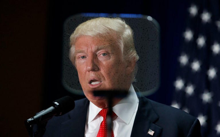 Hillary Clinton's team is raising questions again about whether Donald Trump has dangerous foreign ties. (AP Photo/Evan Vucci)