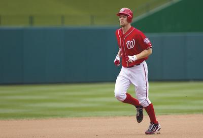 Manuel Balce Ceneta/AP
Right-hander Stephen Strasburg took his time circling the bases at Nationals Park after he hit his first career home run in a victory over the Orioles on Sunday afternoon.