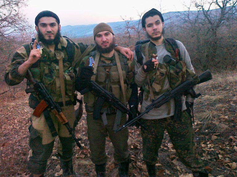 In this undated photo provided by the Dagestani branch of the Federal Security Service William Plotnikov, right, poses for a photo. Security officials suspected ties between elder Boston bombing suspect Tamerlan Tsarnaev and the Canadian, an ethnic Russian named William Plotnikov, who had joined the Islamic insurgency in the region. Russian agents placed the elder Boston bombing suspect under surveillance during a six-month visit to southern Russia last year, then scrambled to find him when he suddenly disappeared after police killed a Canadian jihadist, a security official told The Associated Press. (AP Photo/Dagestani branch of the Federal Security Service via NewsTeam)