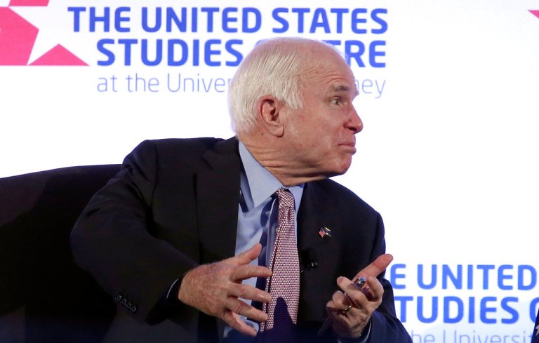 U.S. Sen. John McCain has a discussion after delivering a speech at the invitation of the United States Studies Centre in Sydney, Tuesday, May 30, 2017. In February, the Republican senator leaped to Australia's defense after President Donald Trump got into a heated discussion with Australian Prime Minister Malcolm Turnbull over an Obama-era agreement on the resettlement of refugees. (AP Photo/Rick Rycroft)