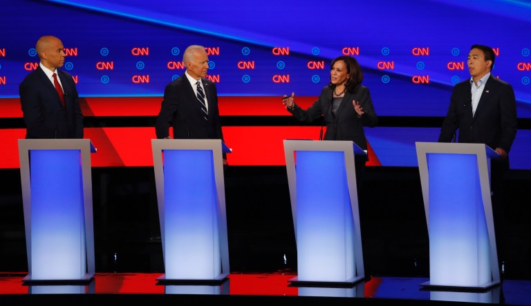 From left, Democratic presidential candidates businessman Tom Steyer, Sen. Elizabeth Warren, D-Mass., former Vice President Joe Biden, Sen. Bernie Sanders, I-VT., former South Bend Mayor Pete Buttigieg, and Sen. Amy Klobuchar, D-Minn., stand on stage, Tuesday, Jan. 14, 2020, before a Democratic presidential primary debate hosted by CNN and the Des Moines Register in Des Moines, Iowa.