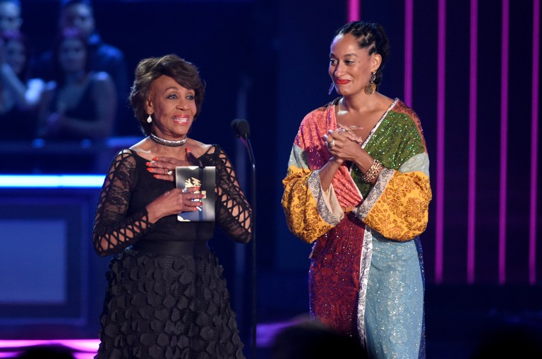 Rep. Maxine Waters, D-Calif. left, and Tracee Ellis Ross present the award for best fight against the system at the MTV Movie and TV Awards at the Shrine Auditorium on Sunday, May 7, 2017, in Los Angeles. (Photo by Chris Pizzello/Invision/AP)