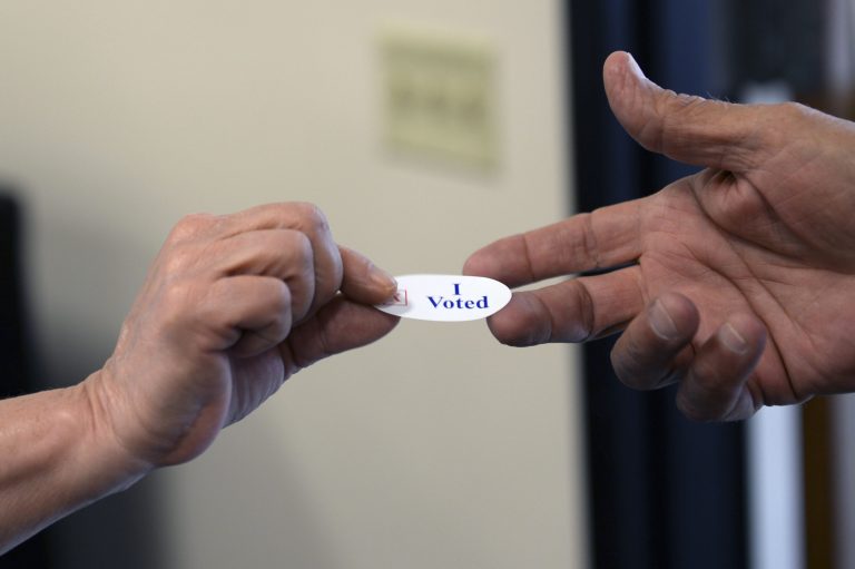 The survey, released on Friday, found that 51 percent of Donald Trump supporters have virtually no confidence that votes cast in the general election will be counted accurately. (AP Photo)