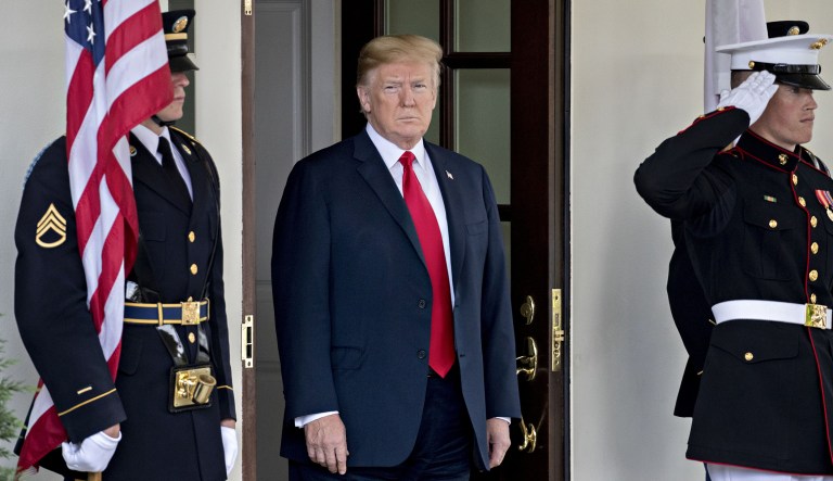U.S. President Donald Trump waits to greet Shinzo Abe, Japan's prime minister, not pictured, at the West Wing of the White House in Washington, D.C., U.S., on Thursday, June 7, 2018. Abe has plenty to worry about ahead of Trump's meeting with Kim Jong Un next week, including the prospect of a deal that undermines Japans six-decade security alliance with the U.S. and leaves the island nation vulnerable to attack.