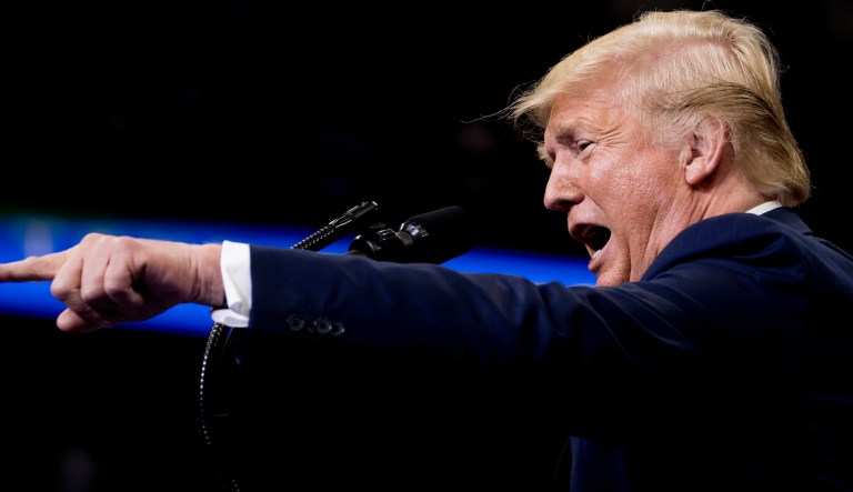 President Donald Trump pumps his fist to the crowd after speaking to a campaign rally in Montoursville, Pa. 