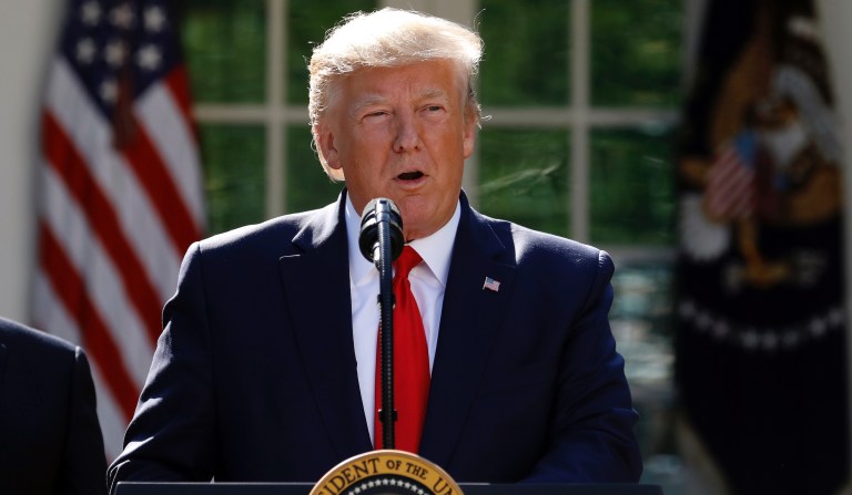 President Donald Trump says he is postponing his weekend trip to Poland and will send Vice President Mike Pence in his place during a event to announce the establishment of the U.S. Space Command in the Rose Garden of the White House in Washington, Thursday, Aug. 29, 2019. 