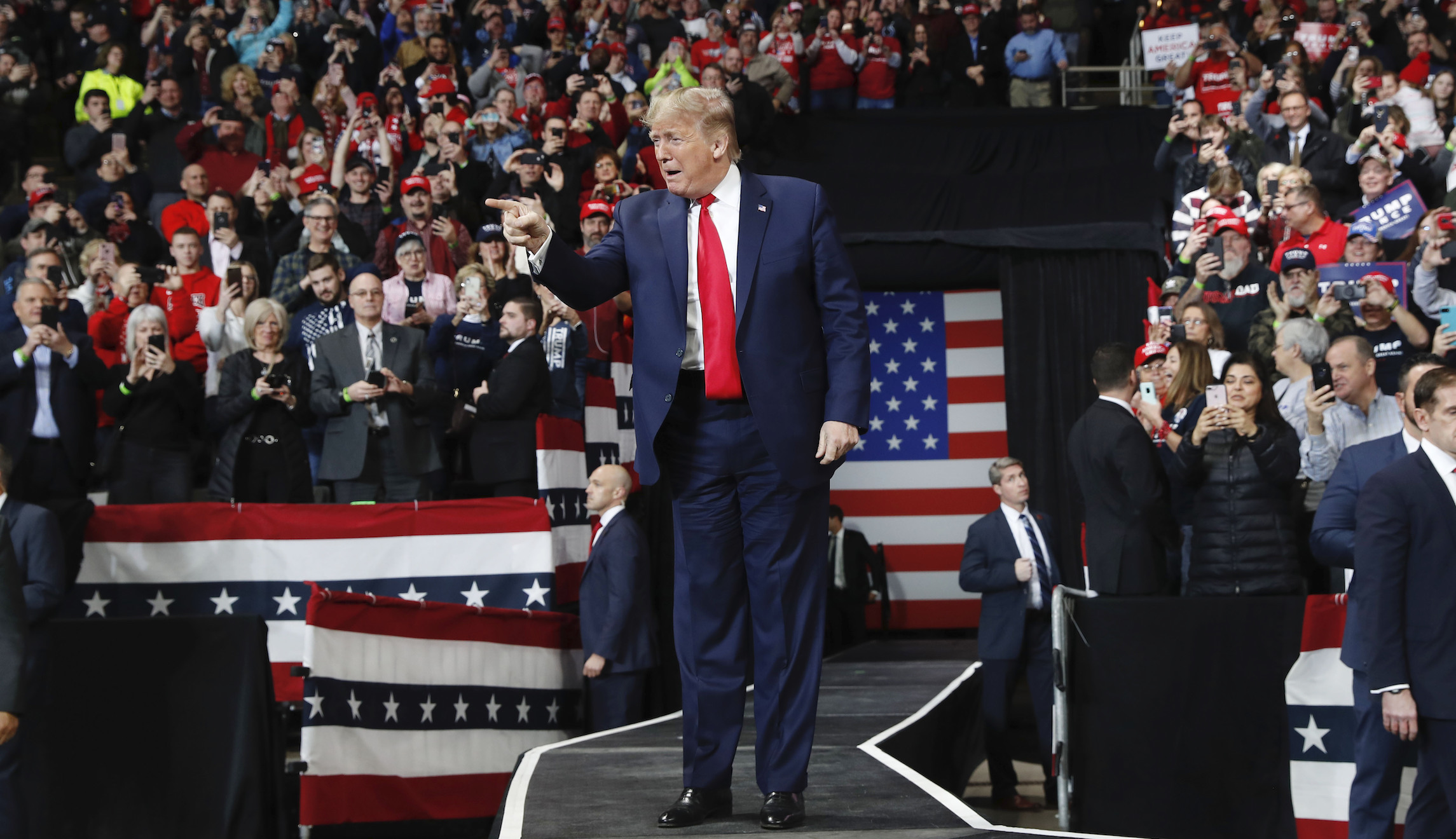 Trump retweets picture of Pelosi and Schumer in Islamic garb with Iranian flag