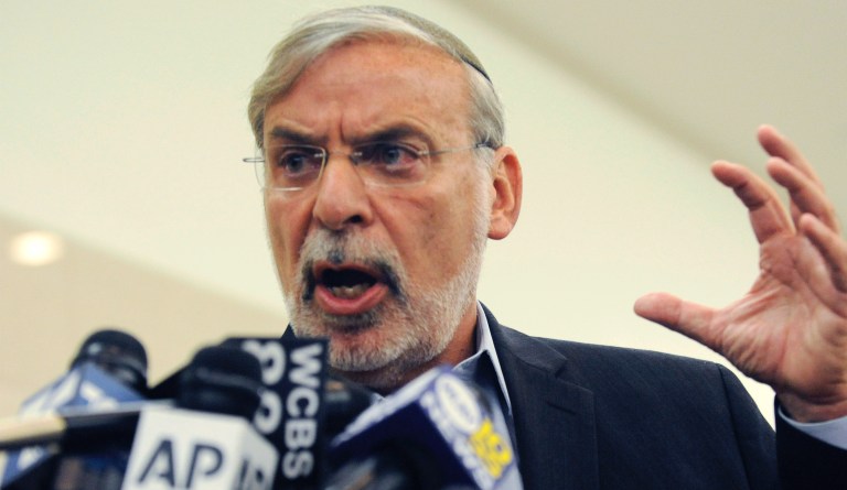 In this Aug. 29, 2012 file photo, then-Brooklyn assemblyman Dov Hikind speaks to the media at Brooklyn State Supreme in New York. Rep. Alexandria Ocasio-Cortez says sheâs sorry for blocking a former Brooklyn elected official from her Twitter account after he was critical of her. 