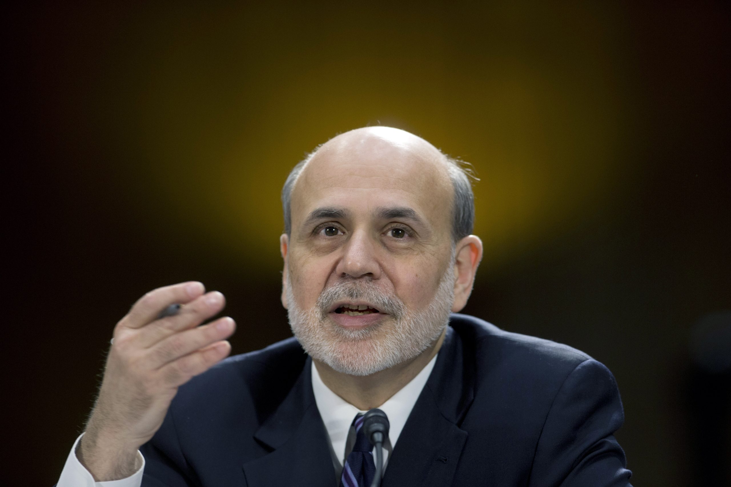Improving US economy leads Fed to ease stimulus