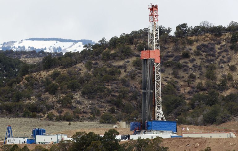A rig drills for natural gas that will eventually be released using hydraulic fracturing, on leased private property outside Rifle, in western Colorado, on March 29. (AP Photo/Brennan Linsley)