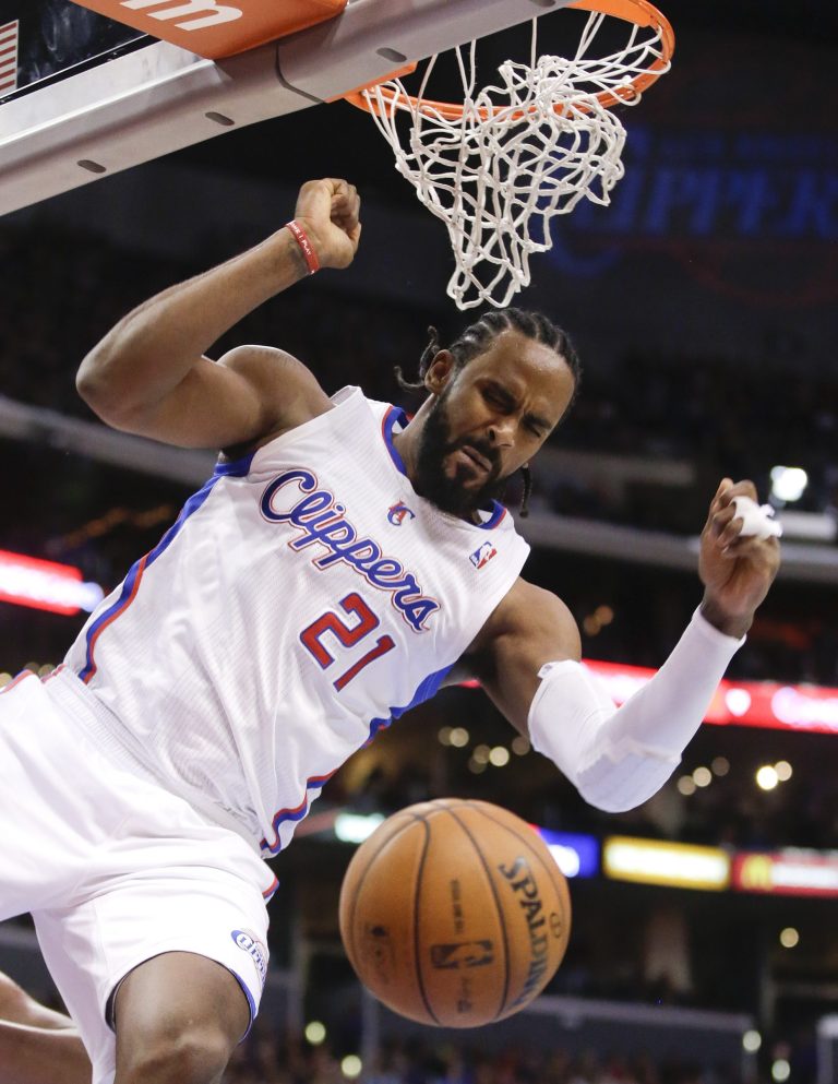   Los Angeles Clippers center Ronny Turiaf celebrates after dunking against the Sacramento Kings during the first half of an NBA basketball game in Los Angeles, Friday, Dec. 21, 2012. (AP Photo/Chris Carlson)  