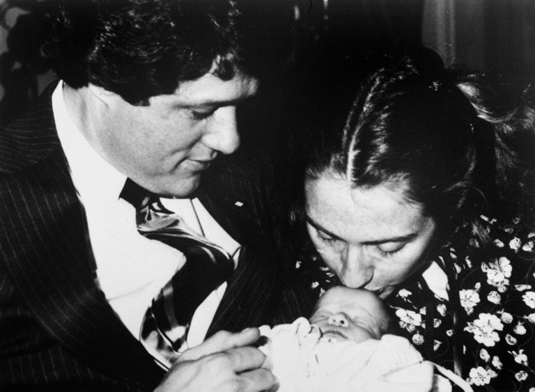 Pictured above, then-Arkansas Gov. Bill Clinton and wife Hillary Rodham and week-old baby daughter Chelsea pose for a family picture, March 5, 1980. (AP Photo/Donald R. Broyles)